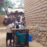 beneficiary carrying food hamper