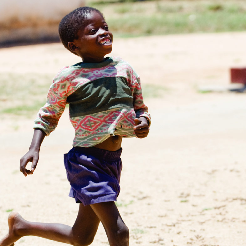 beneficiary carrying food hamper